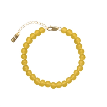 Det smukke Candy Coral Honey armbånd fra House of Vincent